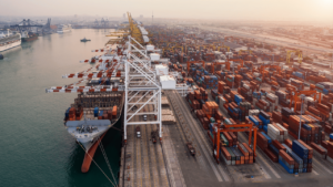 A ship unloading tariffed goods in a port