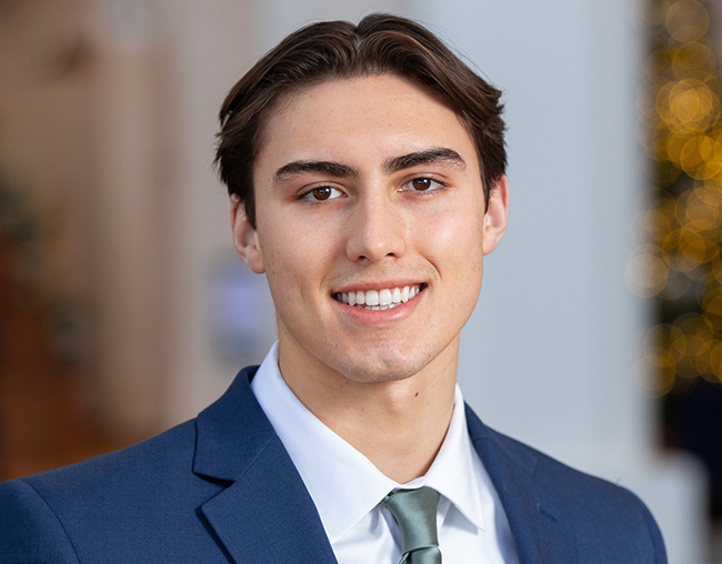 Headshot of Aidan Chacon.