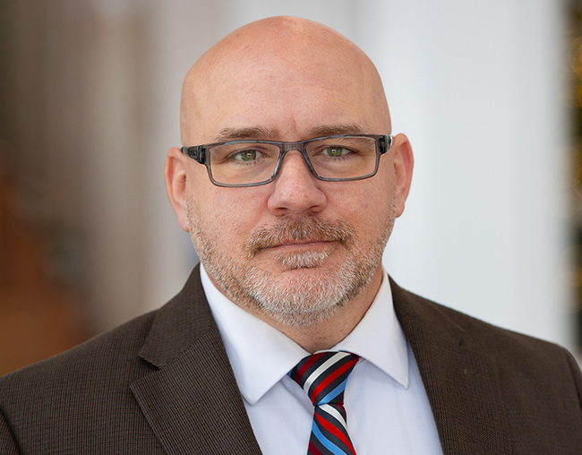 Headshot of Brian Olsen.