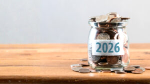 A jar with coins labeled "2026"
