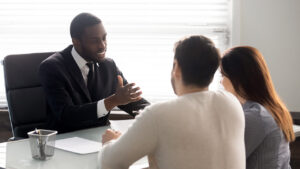 A couple meeting with a financial advisor.