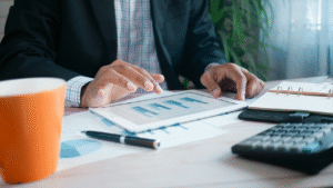 Person looking at chart on tablet