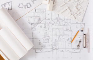 Architecture and engineering project on desk.