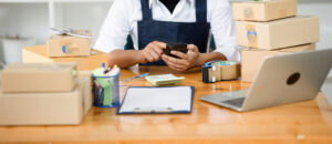 Small business owner researching acquisition loans.